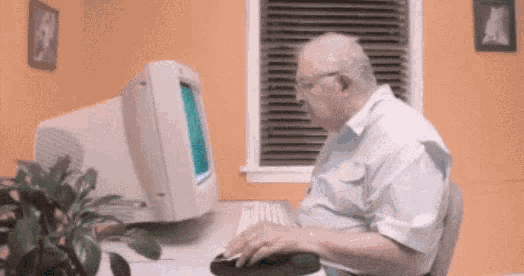 Animated GIF of man throwing his computer in the trash, representing frustration with digital ownership